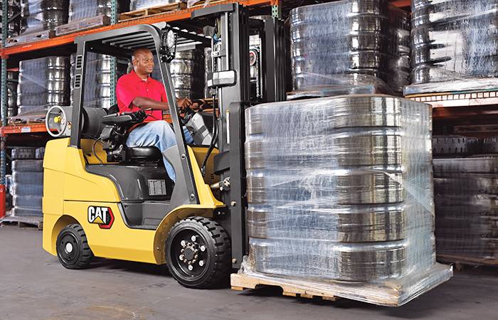 cat class iv forklift driving with load
