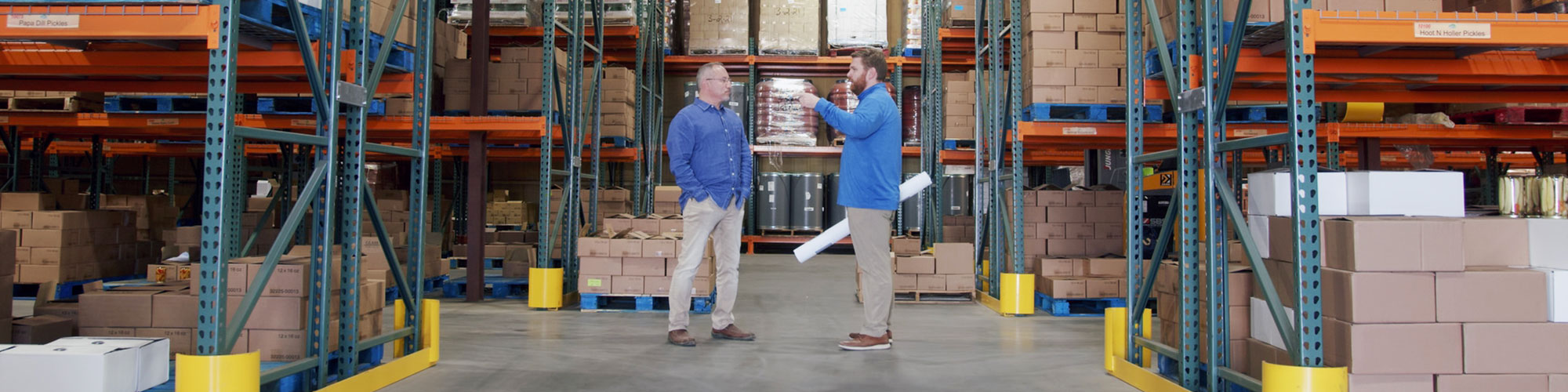 Two men planning warehouse design