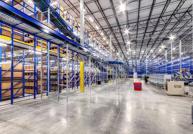 Dallas Cowboys merchandising warehouse with pallet racks and conveyors