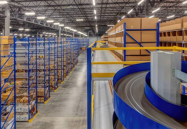 Overhead view of a warehouse with racking and conveyor