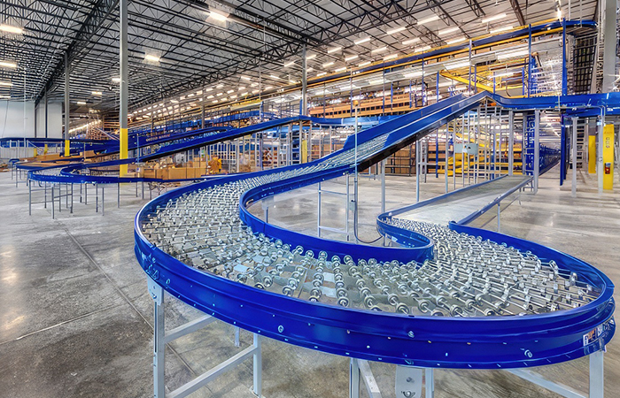 Two men in an empty warehouse